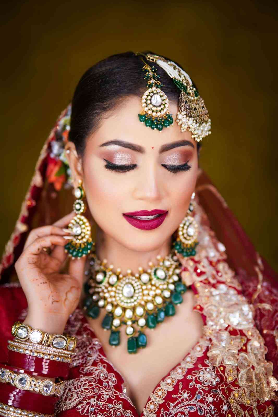 Regal Bold Red Bridal Makeup with Dramatic Lips
